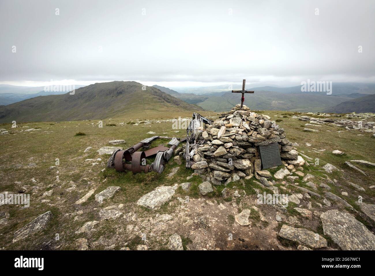 The memorial on Great Carrs to the eight crew members of a Halifax bomber that crashed on the mountain in 1944. The plane's undercarriage can be seen Stock Photo