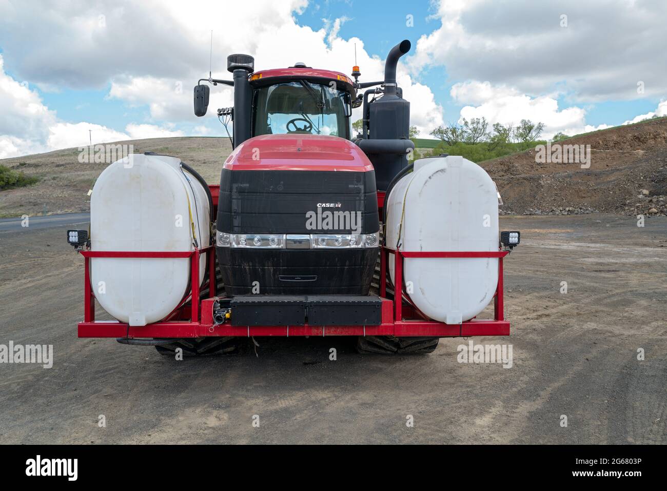 The front of a Case IH Steiger JTI 620 Quadtrac tractor in a parking