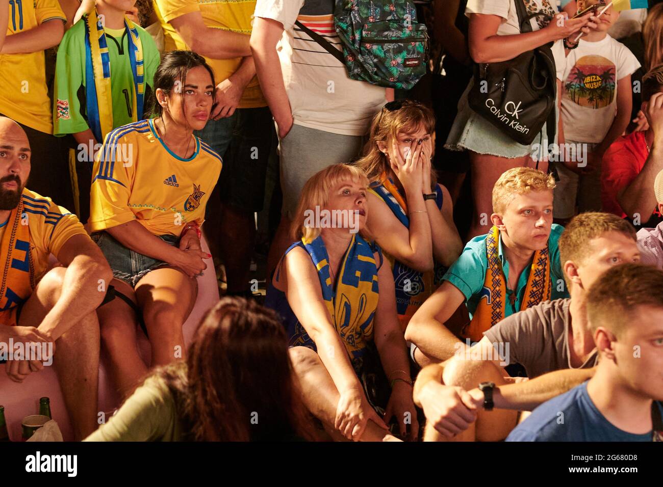 KHARKIV, UKRAINE - JULY 3, 2021: EURO 2020 Ukraine - England. Ukrainian soccer fans cheer at the Fan Zone in Kharkiv Stock Photo