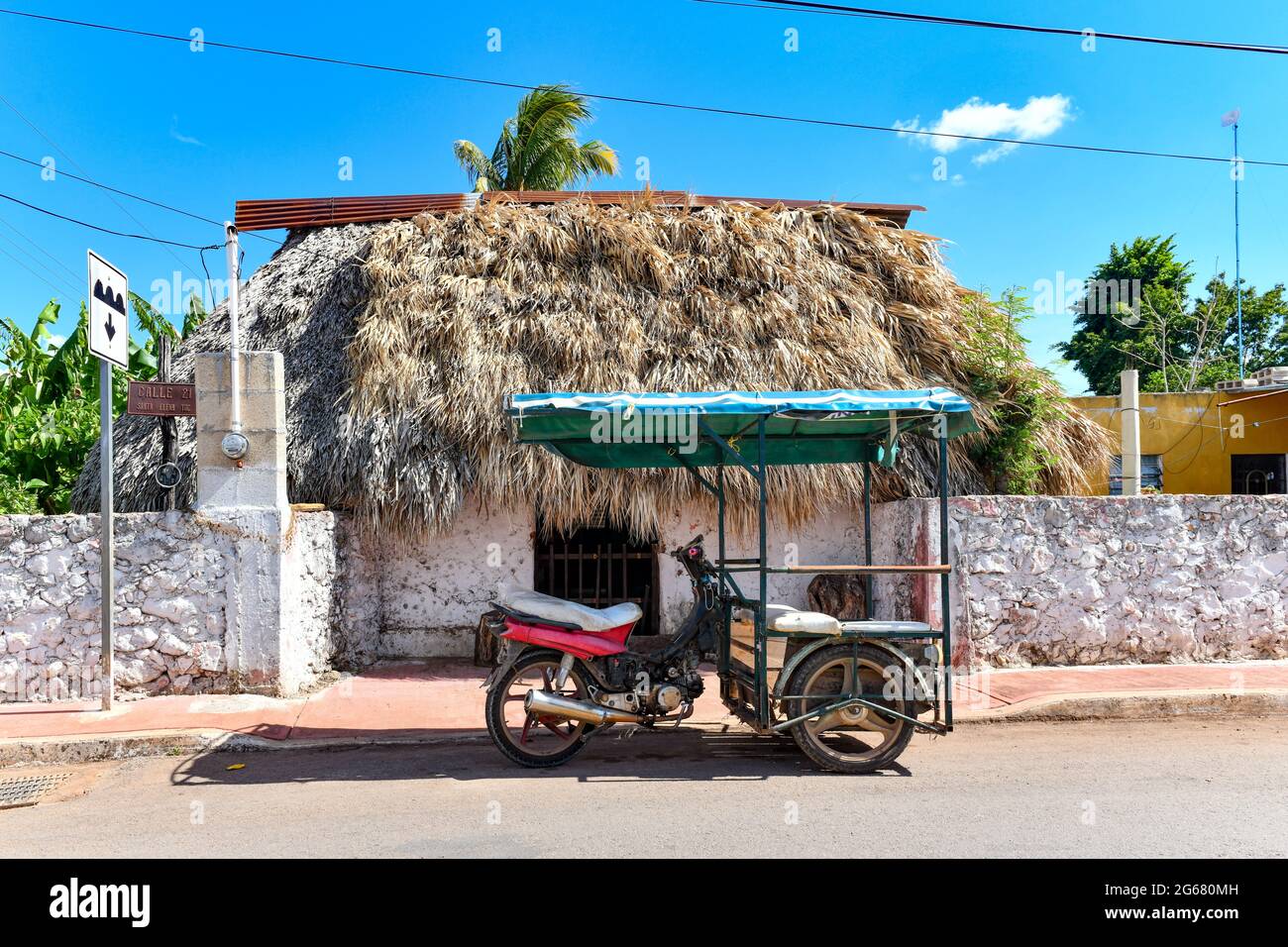 A retrofitted motorcycle, a form of local transportation in Santa Elena, Mexico in the Yucatan. Stock Photo