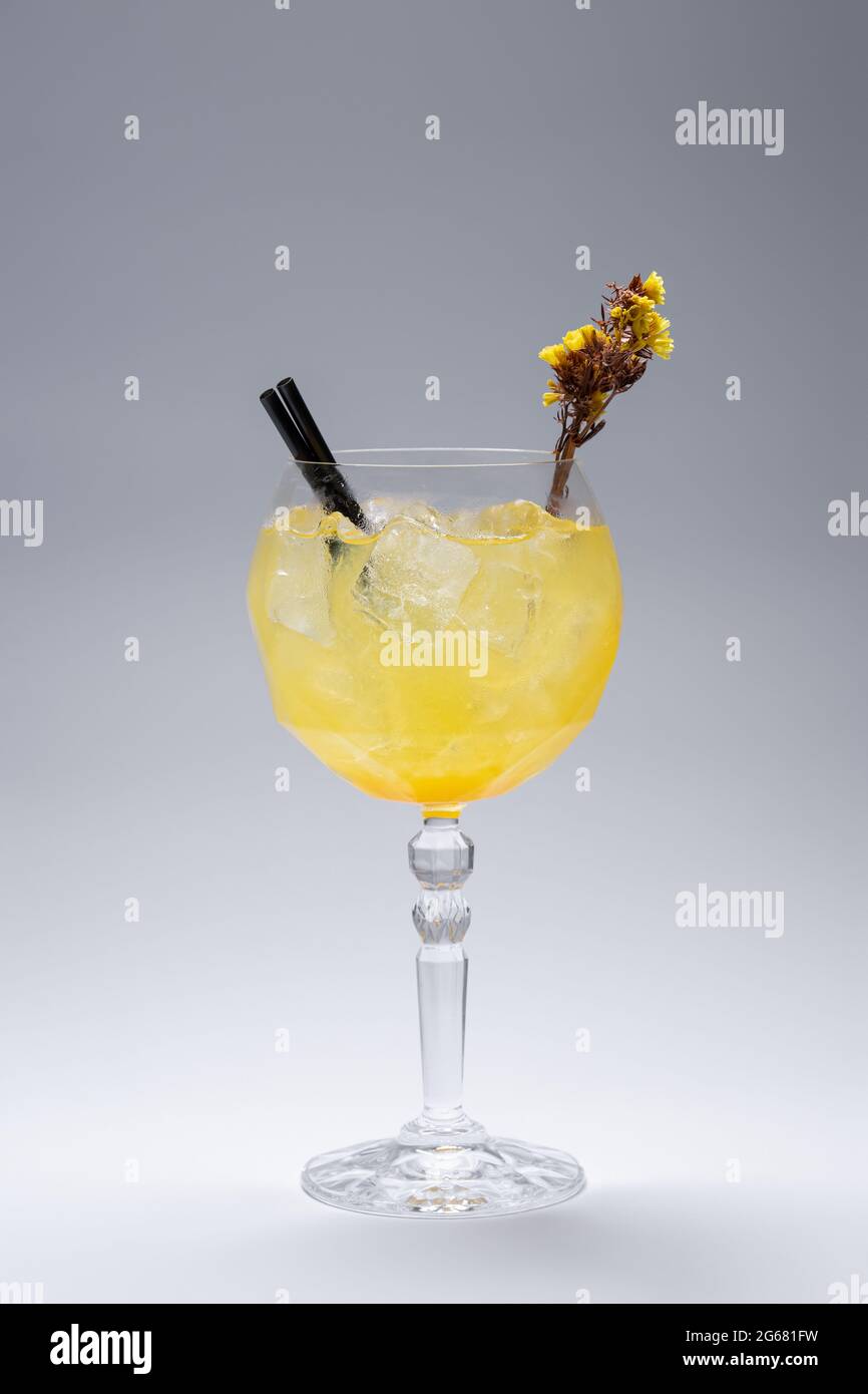 luxury gin hass orange cocktail drink with ice in glass on white background Stock Photo