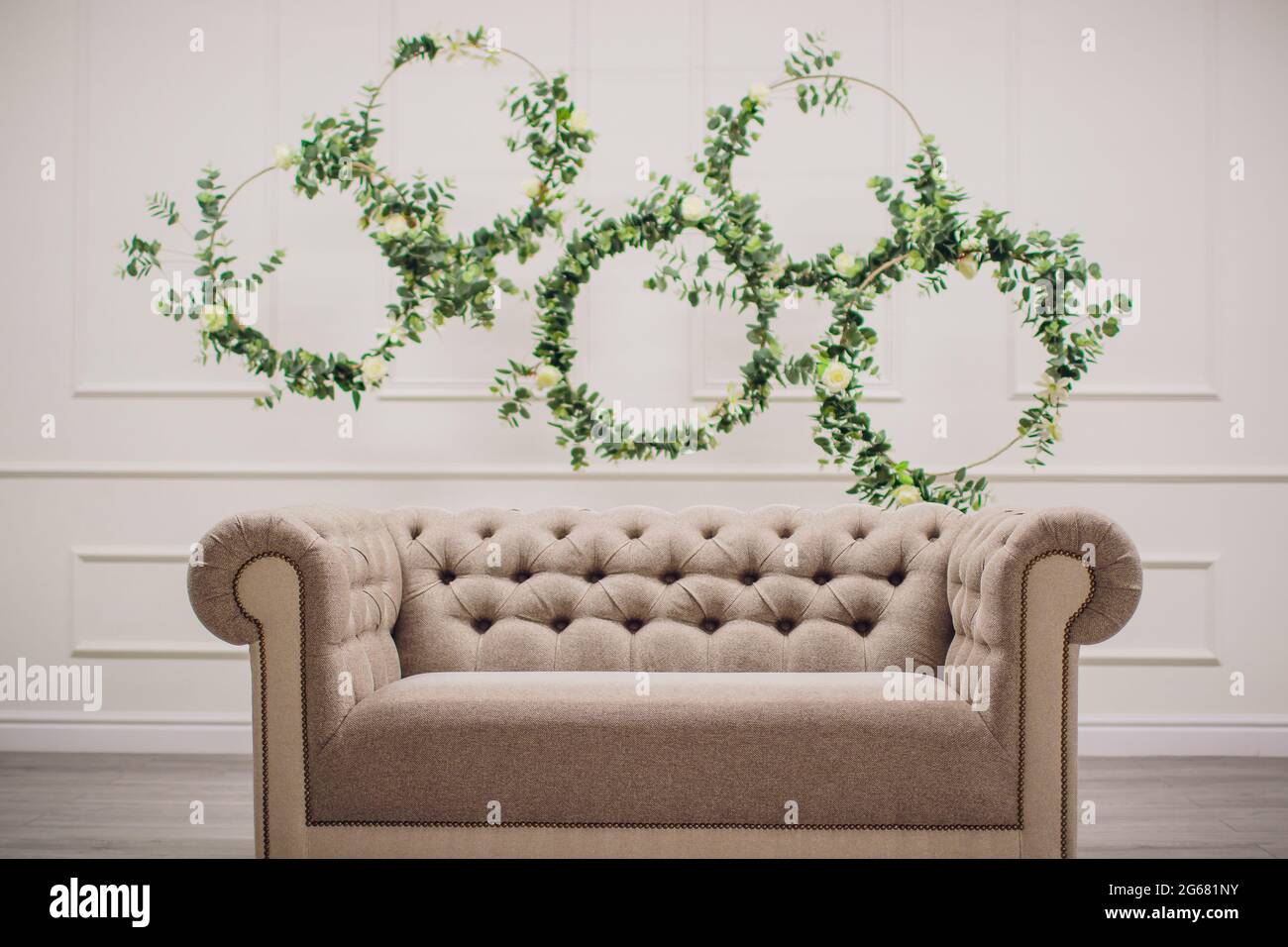 Living room with sofa Spring interior in a photo studio Background for  photo shoot Stock Photo - Alamy