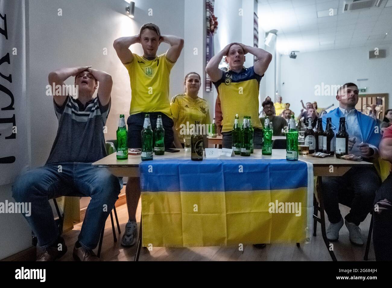London, UK. 3rd July, 2021. UEFA EURO 2020: Ukraine vs England. British-Ukrainians feeling deflated after losing to England 4-0 whilst watching the match at the Association of Ukrainians in Great Britain (AUGB) venue in Holland Park. Credit: Guy Corbishley/Alamy Live News Stock Photo