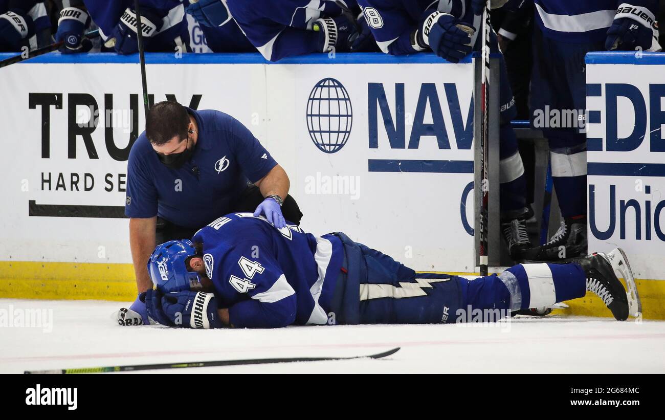Lightning defenseman Jan Rutta remains down after a hit to the head by