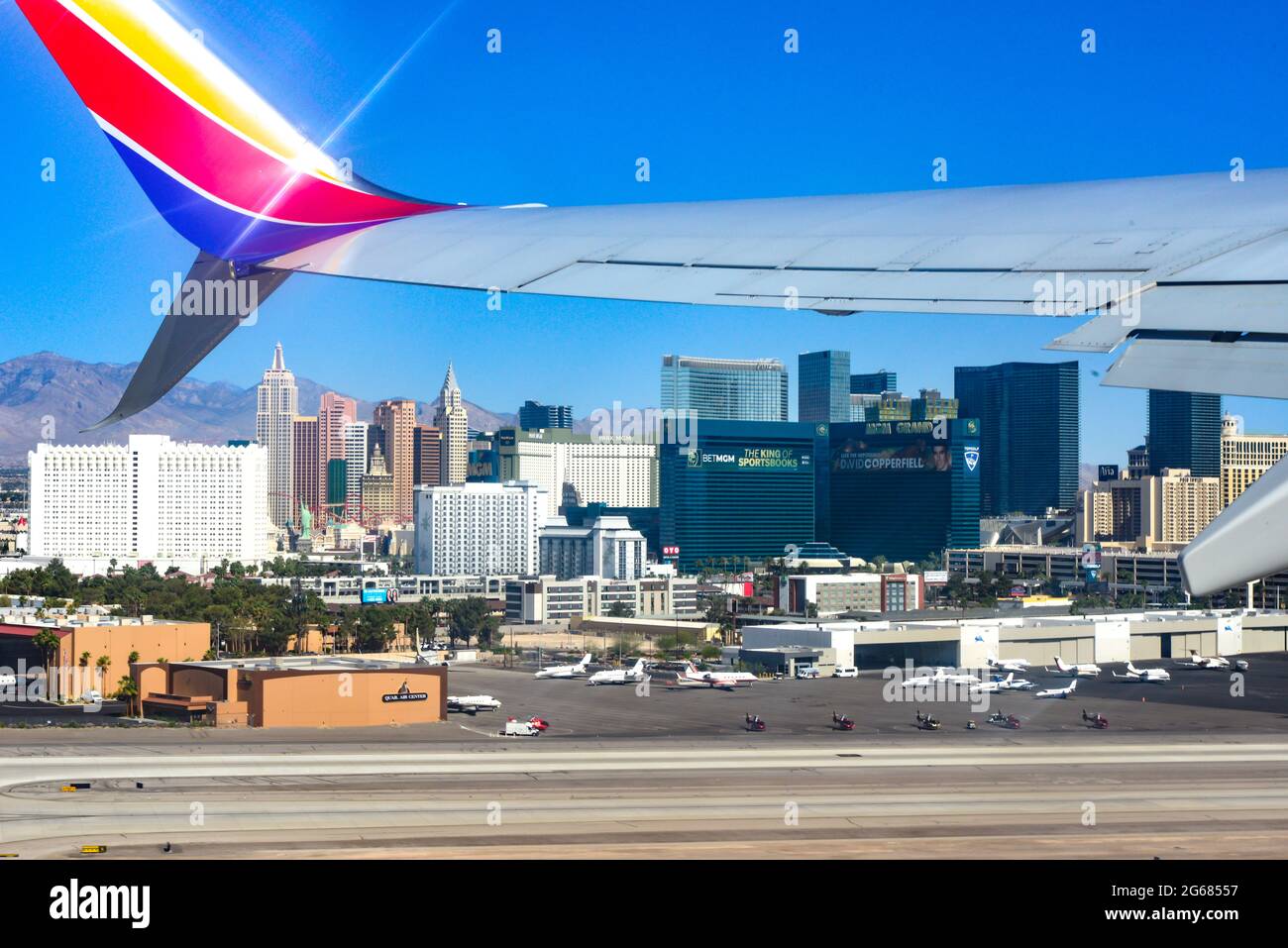 View from the cabin window of a 780 Max Southwest Airlines jet just after lift off, with a view of the casinos lining the Strip at the Las Vegas MaCar Stock Photo