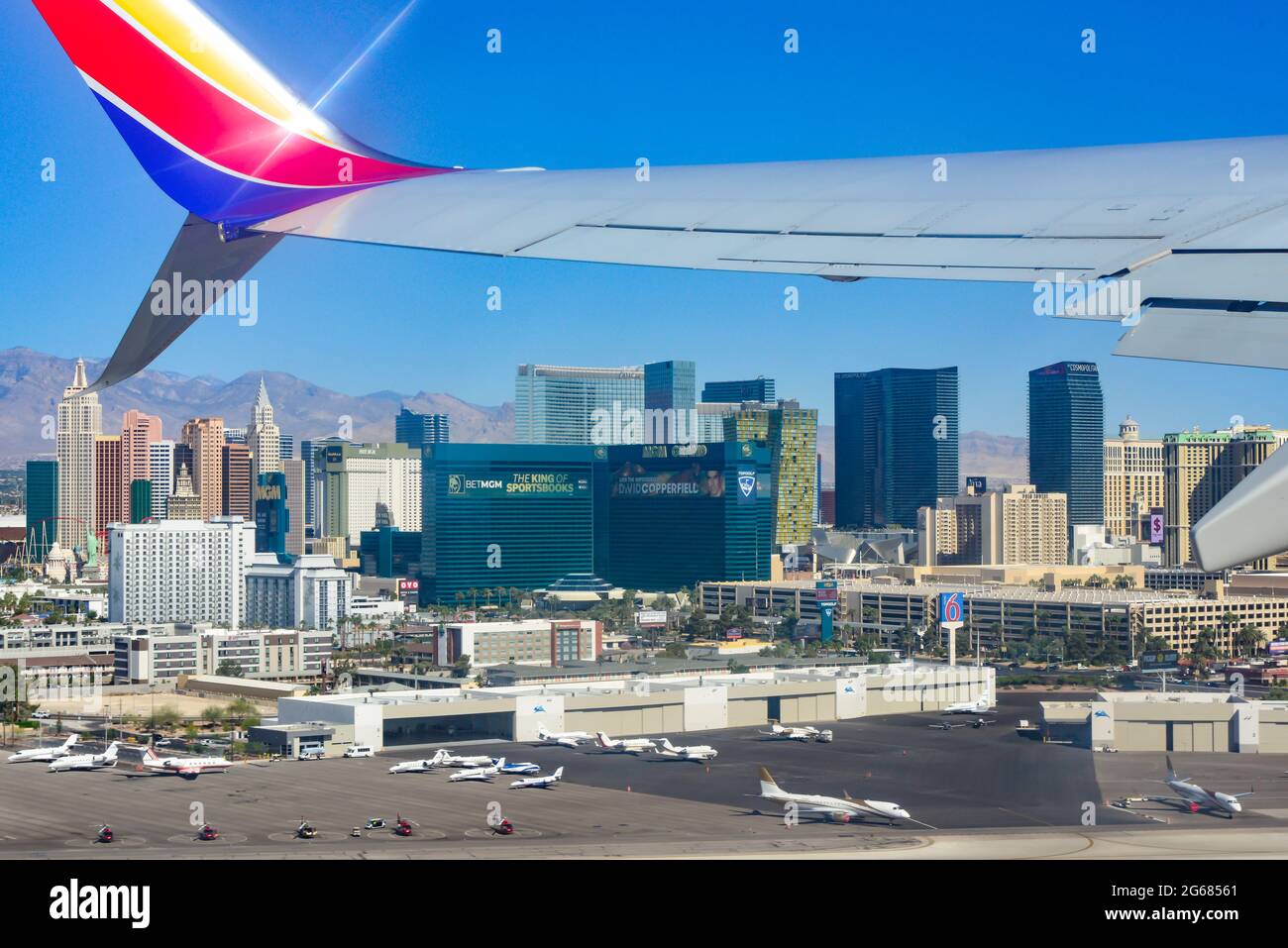View from the cabin window of a 780 Max Southwest Airlines jet soon after lift off, with a view of the casinos lining the Strip at the Las Vegas MaCar Stock Photo
