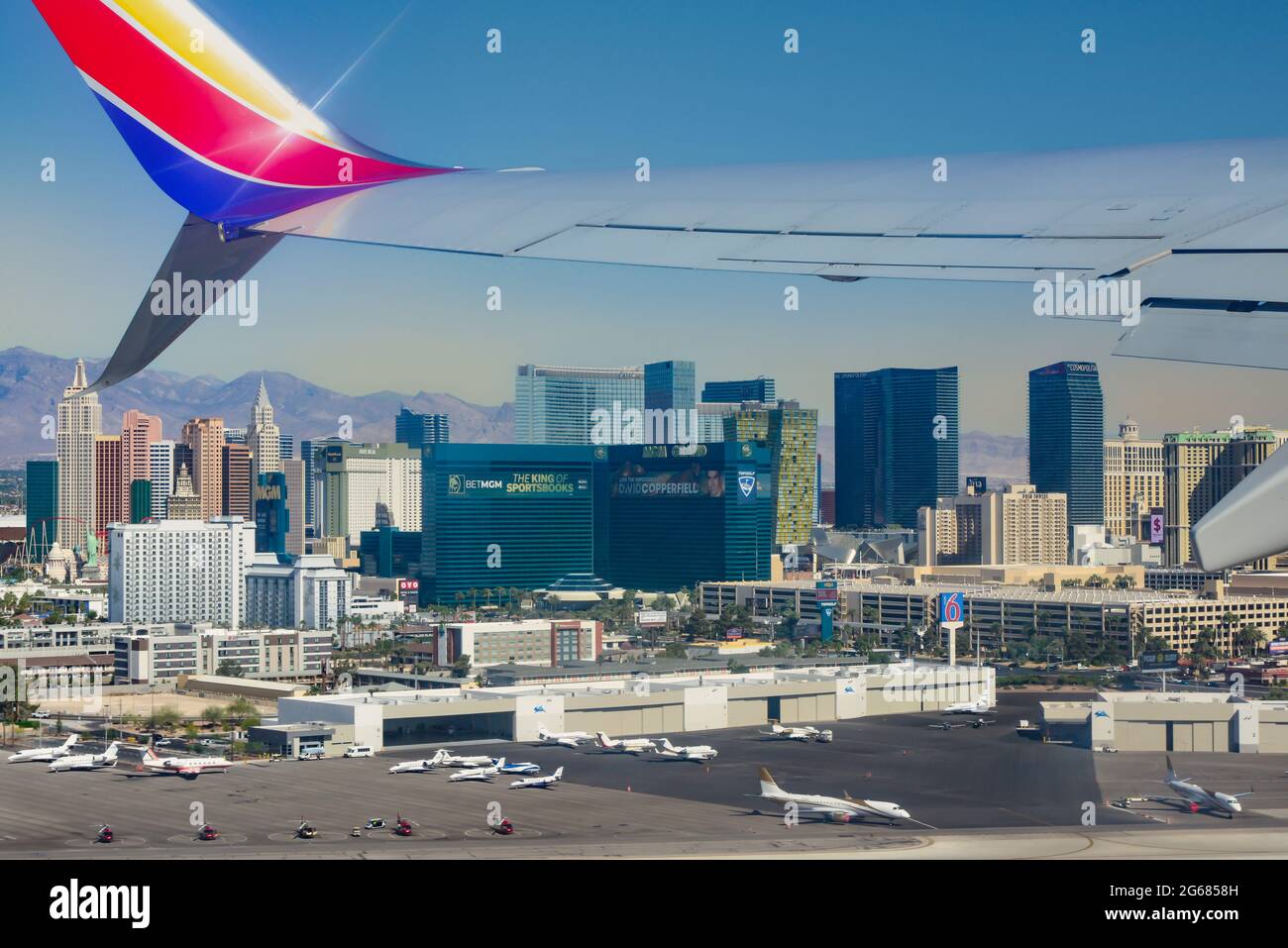 View from the cabin window of a 780 Max Southwest Airlines jet soon after lift off, with a view of the casinos lining the Strip at the Las Vegas MaCar Stock Photo