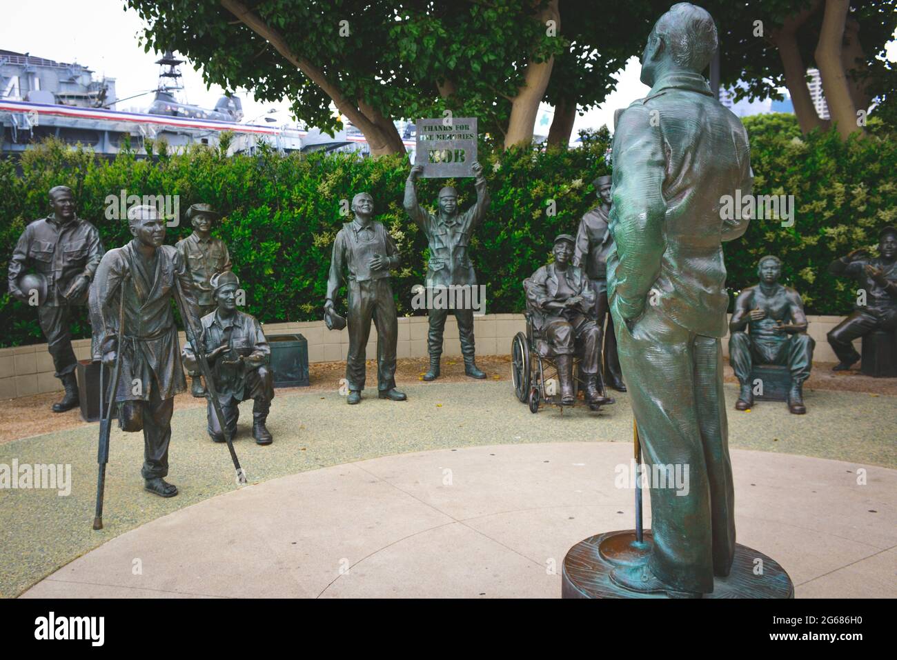 Bronze statues of military troops enjoying entertainment by Bob Hope at the 'National Salute to Bob Hope and the Military' memorial, San Diego, CA Stock Photo