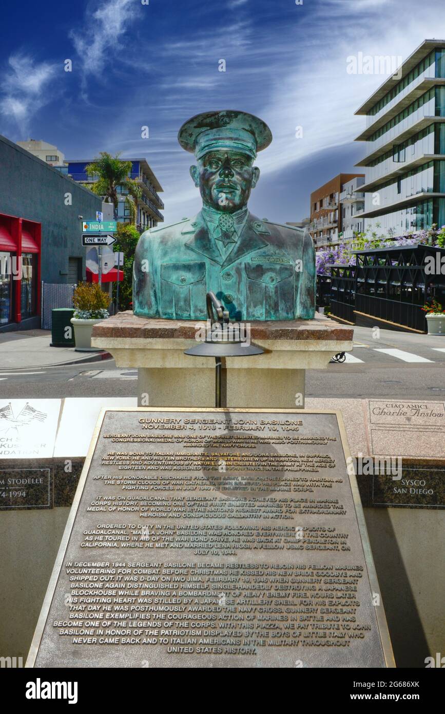 The bronze bust of John Basilone, a world war II hero, with dedication plaque stands in Little Itlay's Piazza Basilone in San Diego, CA Stock Photo