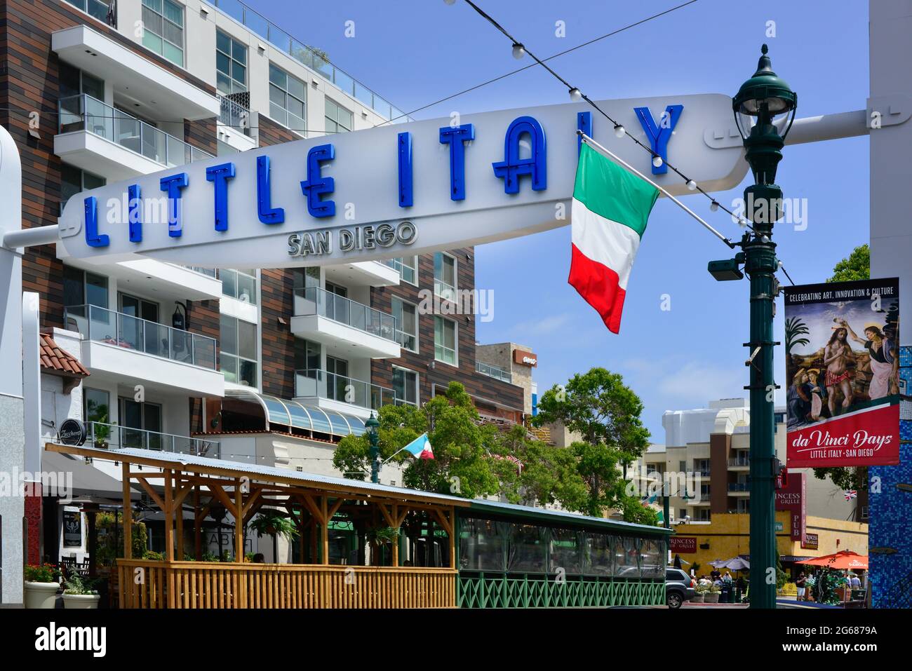 The 'Little Italy' landmark overhead sign for the historically Italian neighborhood, now full of upscale condos and trendy eateries, San Diego, CA Stock Photo