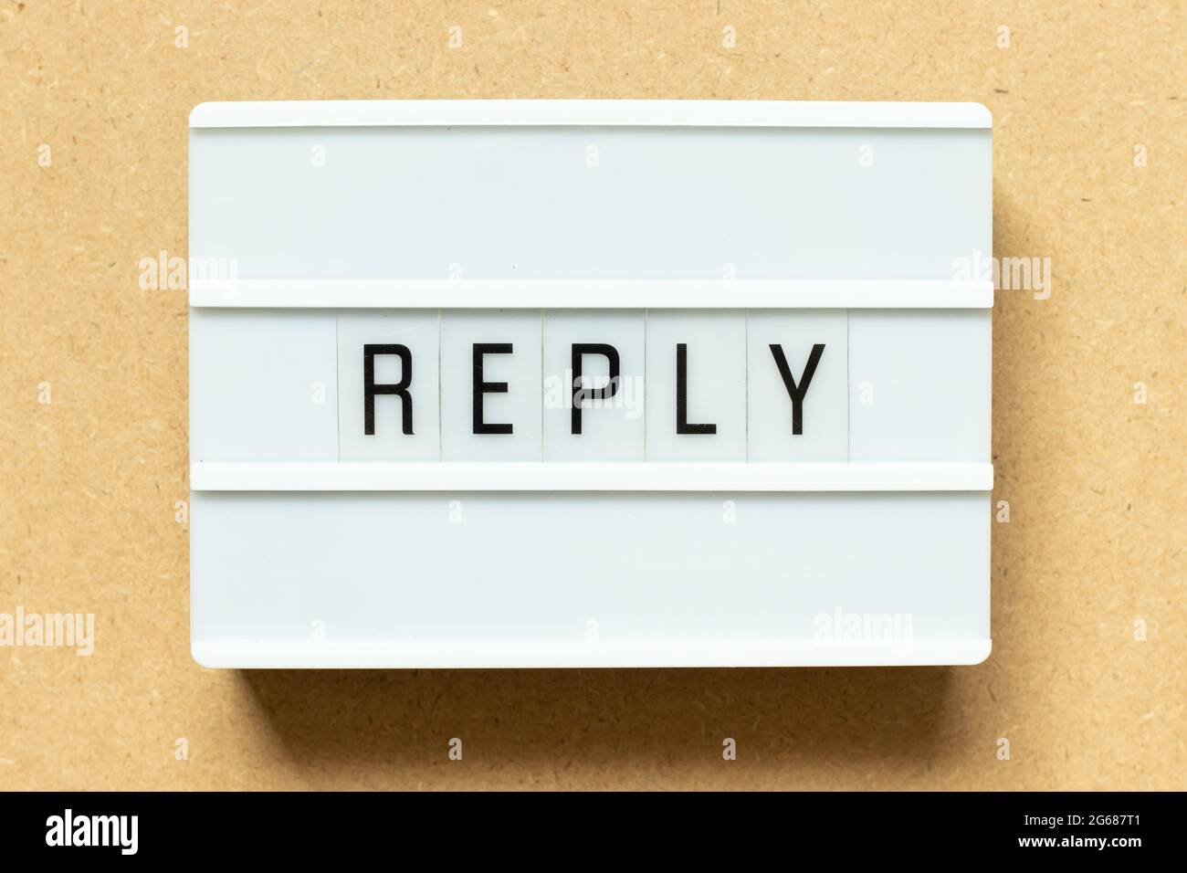 Lightbox with word reply on wood background Stock Photo
