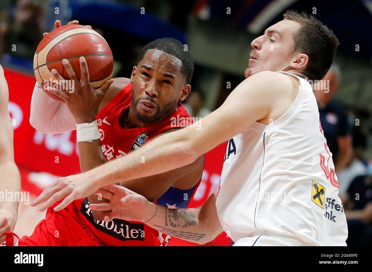 Belgrade. 3rd July, 2021. Puerto Rico's Gary Browne (L) vies with Serbia's  Danilo Andjusic during FIBA Olympic Qualifying Tournament basketball  semi-final match between Serbia and Puerto Rico in Belgrade, Serbia on July