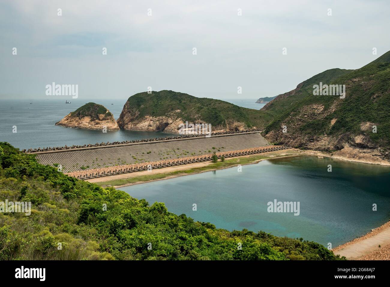 The cofferdam and dolosse at the High Island Reservoir East Dam, Sai Kung Peninsula, New Territories, Hong Kong Stock Photo