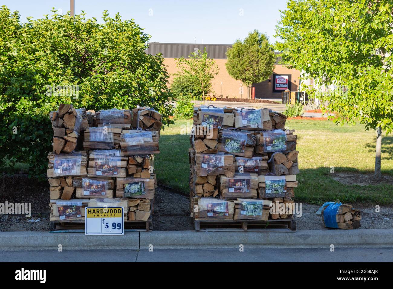 Two pallets of prepackaged firewood for sale Stock Photo Alamy