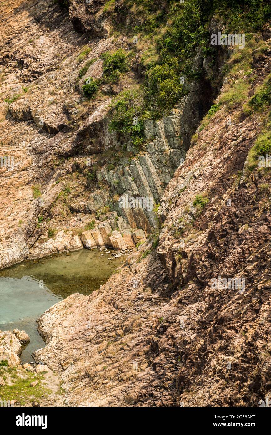Hexagonal basaltic columns, a primary feature of the Hong Kong UNESCO Global Geopark, Sai Kung East Country Park, New Territories, Hong Kong Stock Photo