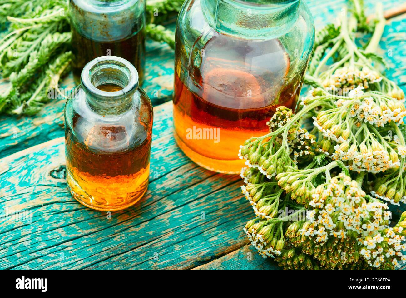 Jar of yarrow tincture.Medicine made from medicinal herbs.Herbalism and