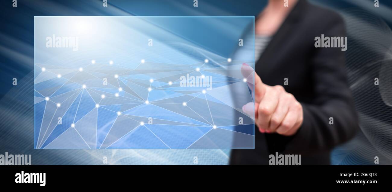 Woman touching a virtual network on a touch screen with her finger ...