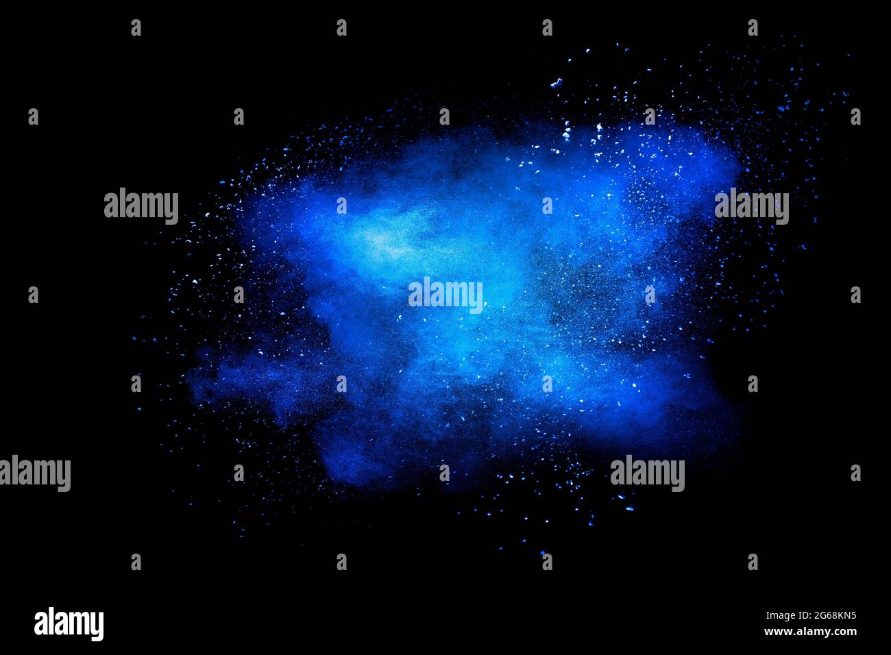 Blue color dust particle explosion cloud on black background.Color powder splash. Stock Photo