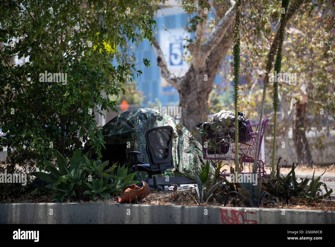 Tent of a homeless person alongside a freeway off ramp in Hollywood ...