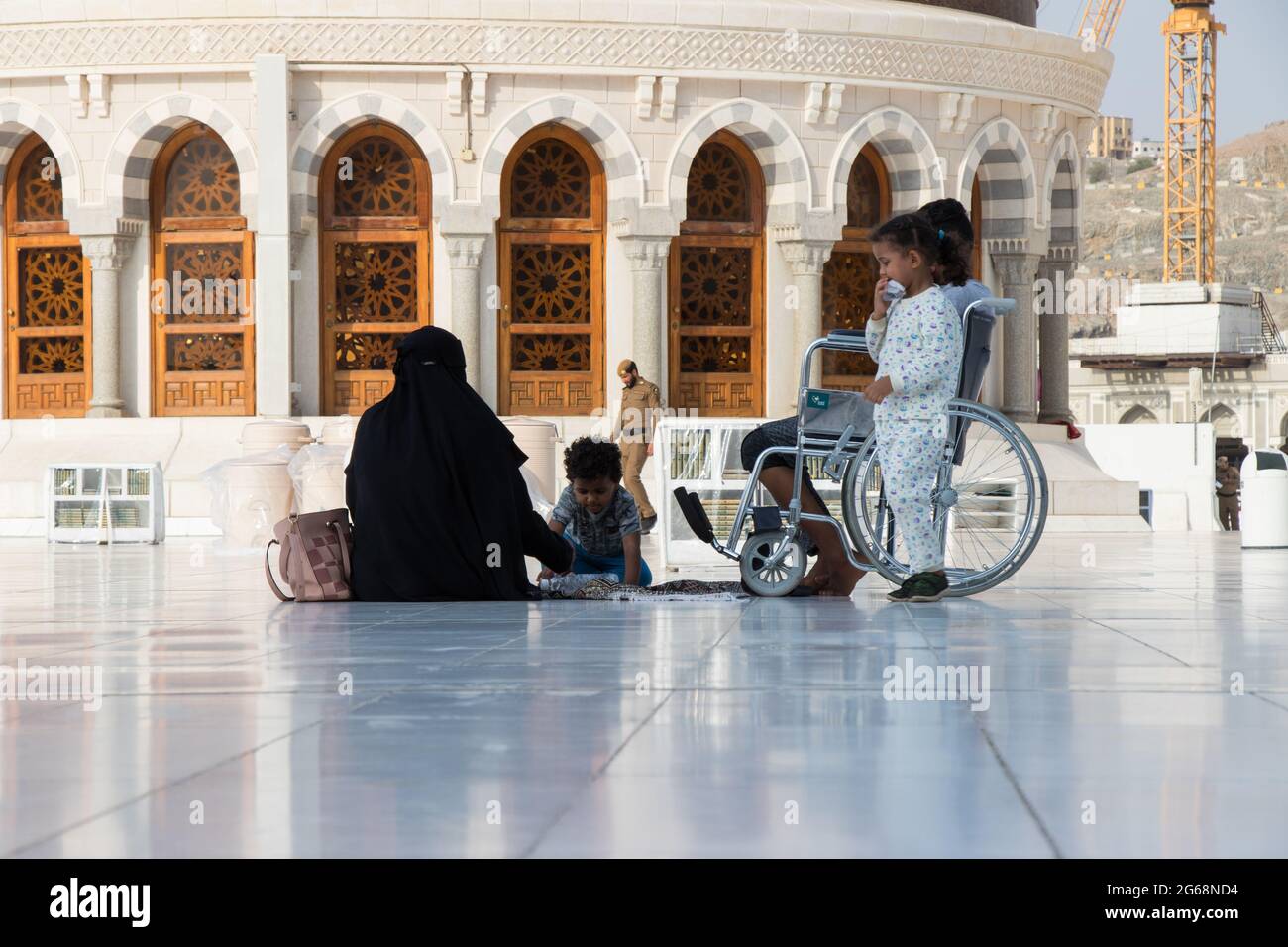 Muslim family in Masjid Haram. Nice day for muslim pilgrims. Mecca