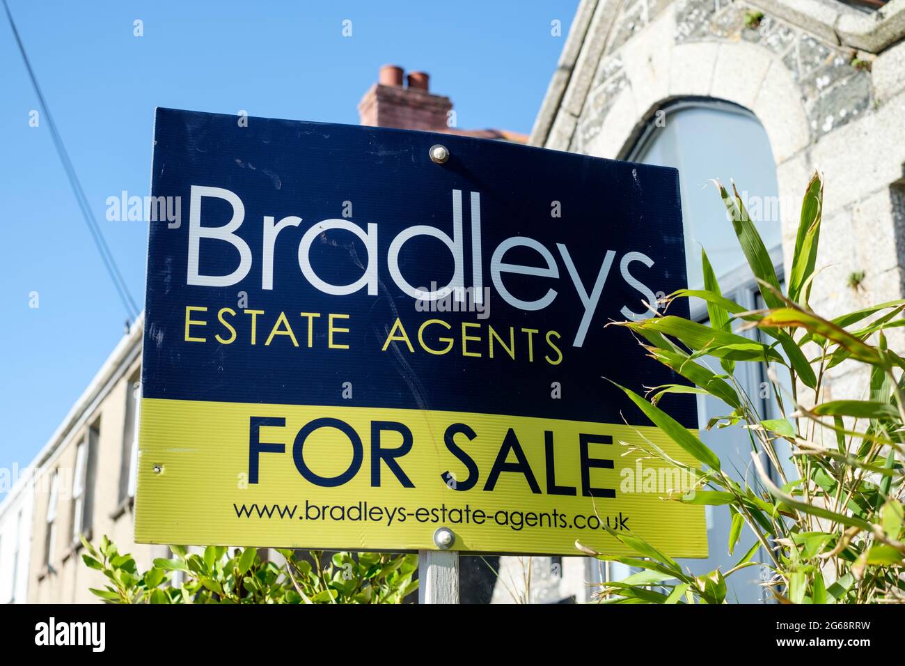 Estate Agent for sale sign in a Cornish village, Cornwall UK Stock Photo