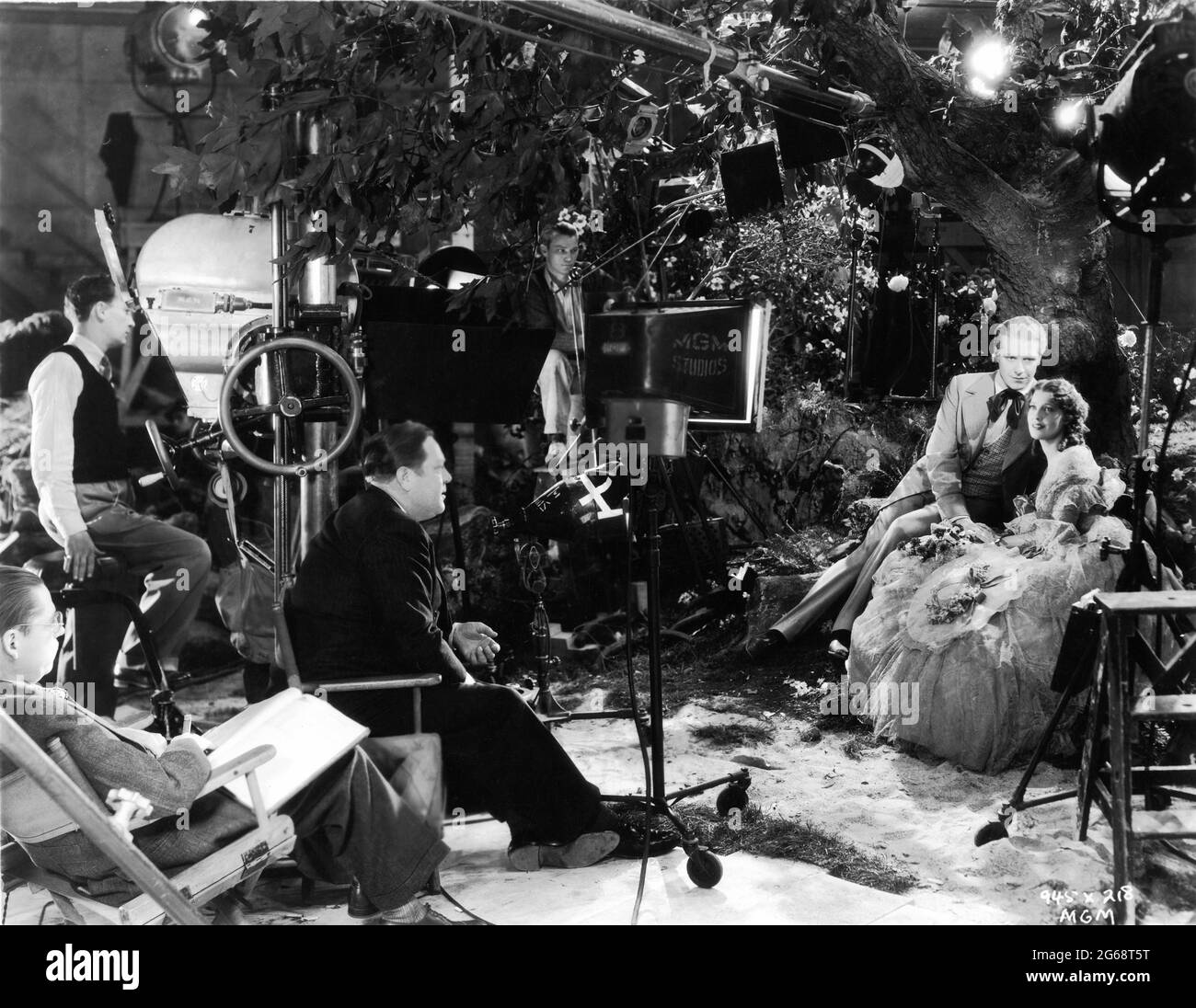 MacDONALD and NELSON EDDY on set candid with Director ROBERT Z