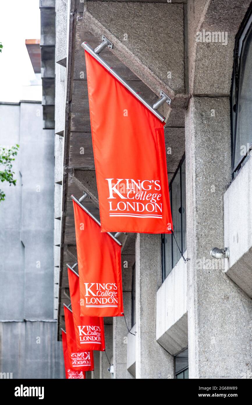 Red flags on the brutalist facade of the Kings College Macadam Building, Strand Campus, Temple, London, UK Stock Photo