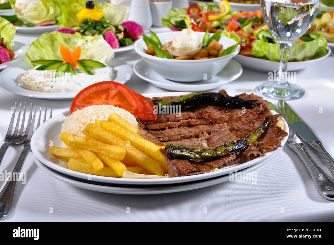 A magnificent dining table and traditional doner kebab in a luxury ...
