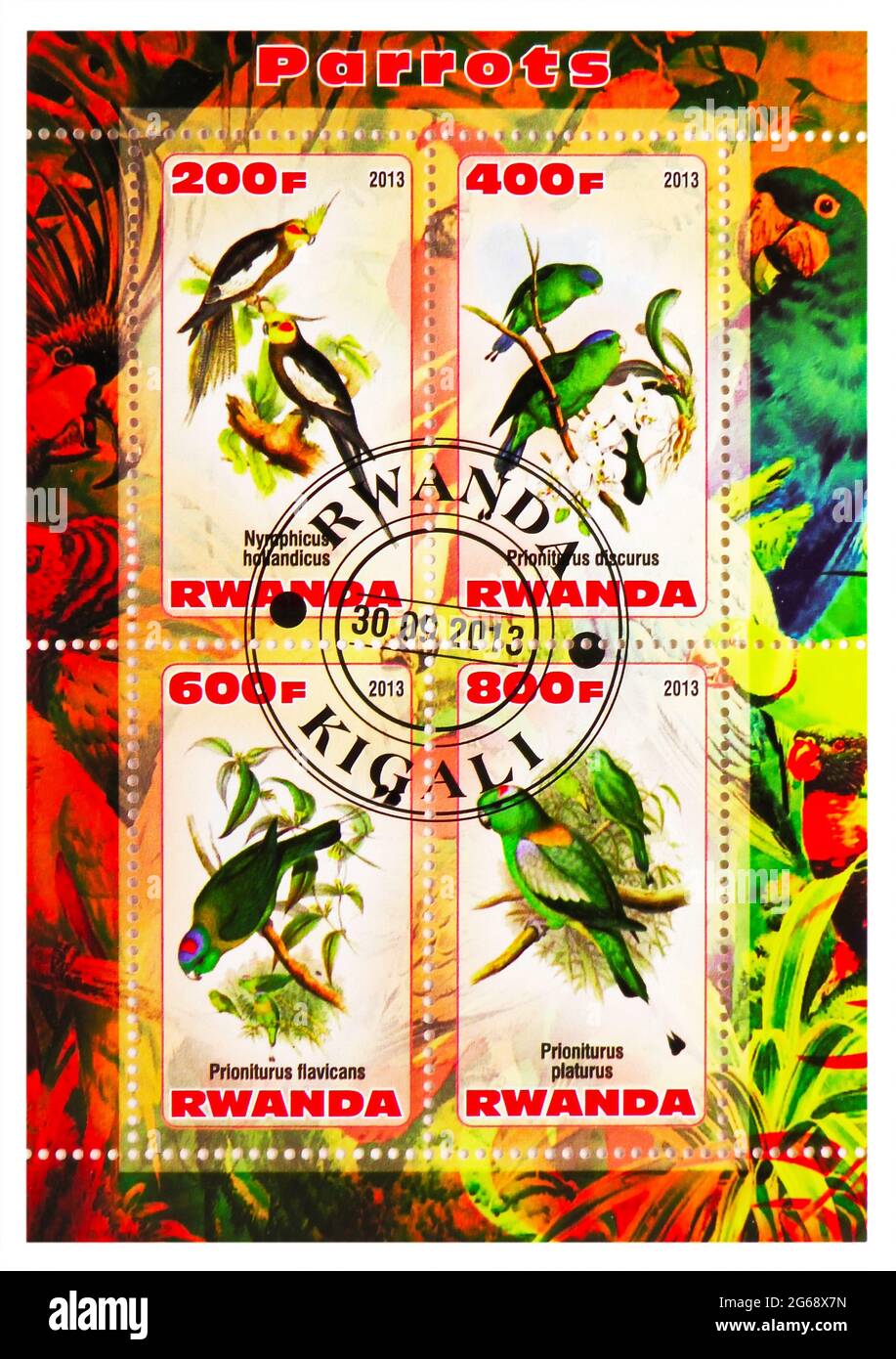 MOSCOW, RUSSIA - MARCH 28, 2020: Four postage stamps printed in Rwanda shows Parrots serie, circa 2013 Stock Photo