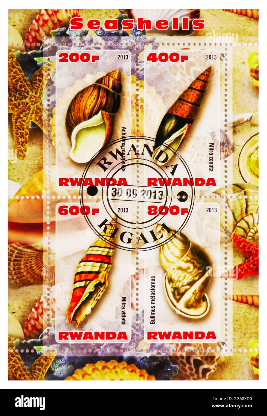 MOSCOW, RUSSIA - MARCH 28, 2020: Four postage stamps printed in Rwanda shows Shells serie, circa 2013 Stock Photo