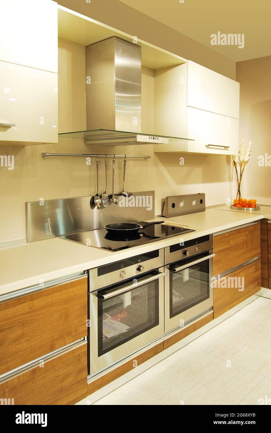 Interior of luxurious modern kitchen equipment, white and walnut ...