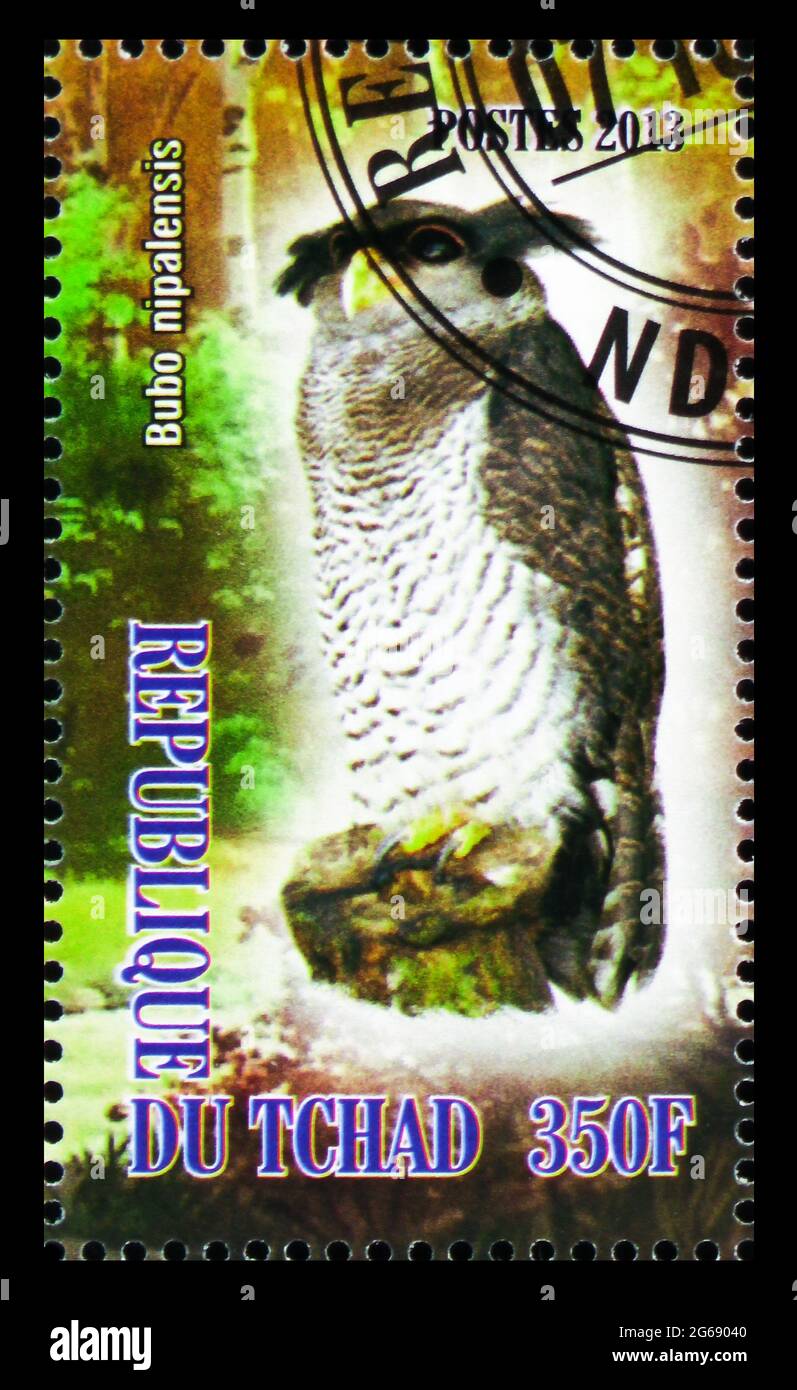 MOSCOW, RUSSIA - MARCH 28, 2020: Postage stamp printed in Chad shows Bubo nipalensis, Owls serie, circa 2013 Stock Photo