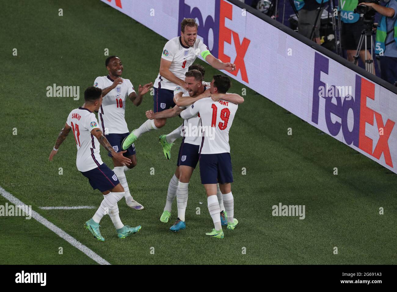 Rome, Italy, 3rd July 2021. Jordan Henderson of England celebrates with  team mates after heading the ball past Georgiy Bushchan of Ukraine to give  the side a 4-0 lead during the UEFA