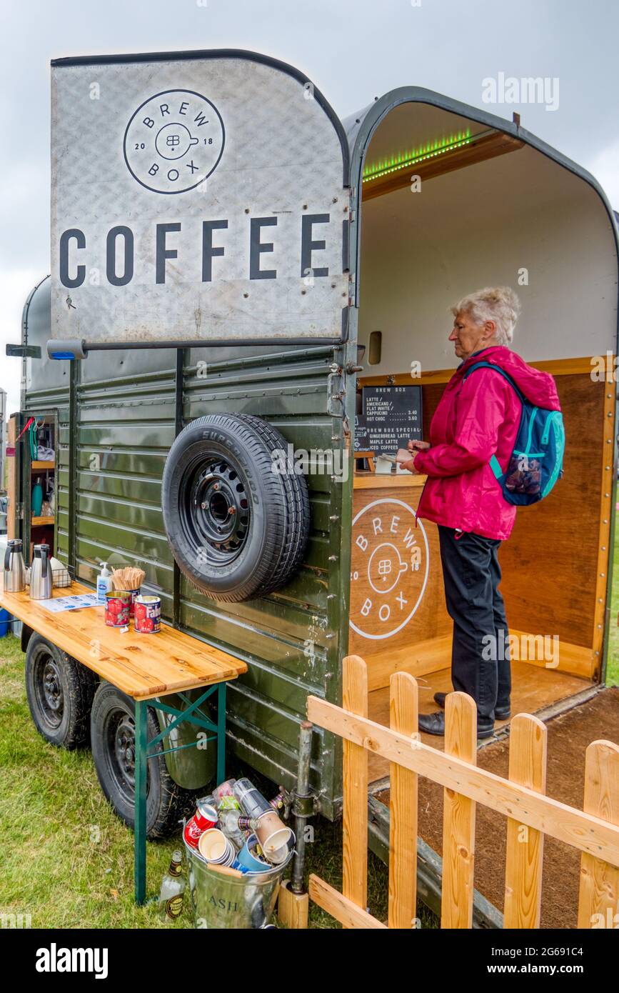 A craft coffee shop in a converted horse box, Wallop Wheels and Wings, Middle Wallop, Hampshire, UK Stock Photo