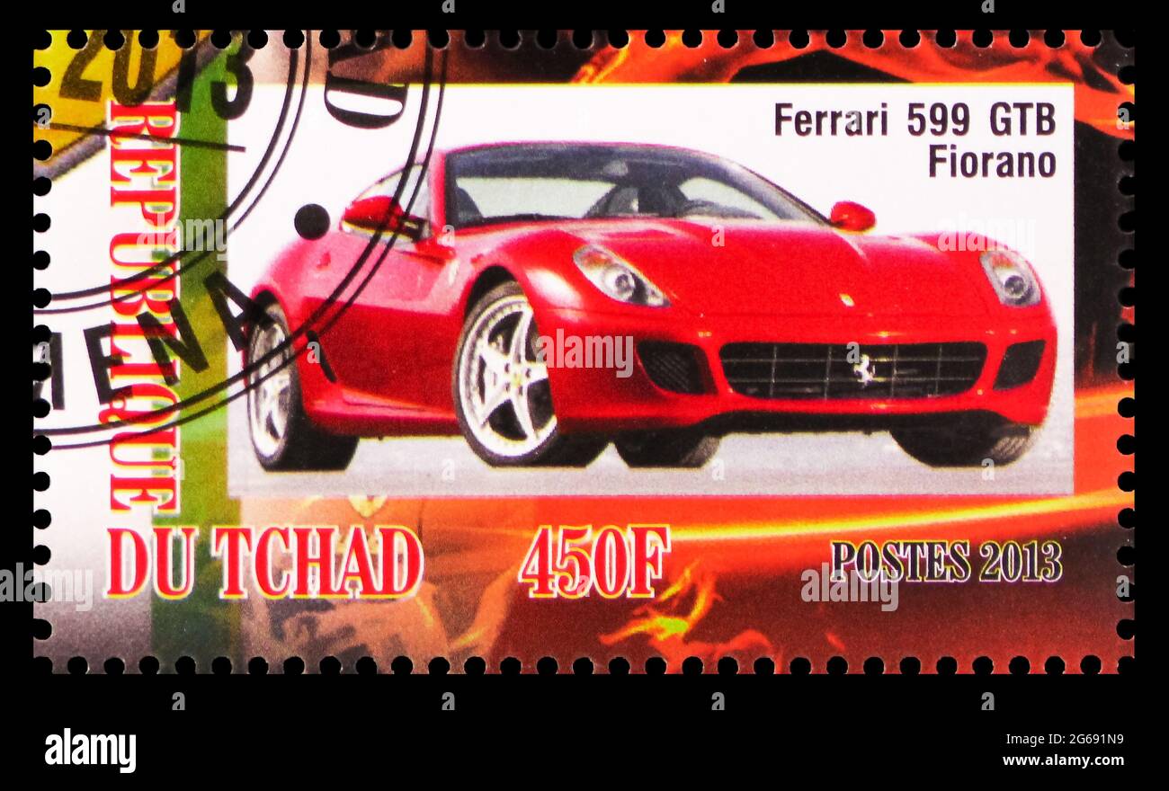 MOSCOW, RUSSIA - MARCH 28, 2020: Postage stamp printed in Chad shows Ferrari 599 GTB Fiorano, Ferrari serie, circa 2013 Stock Photo