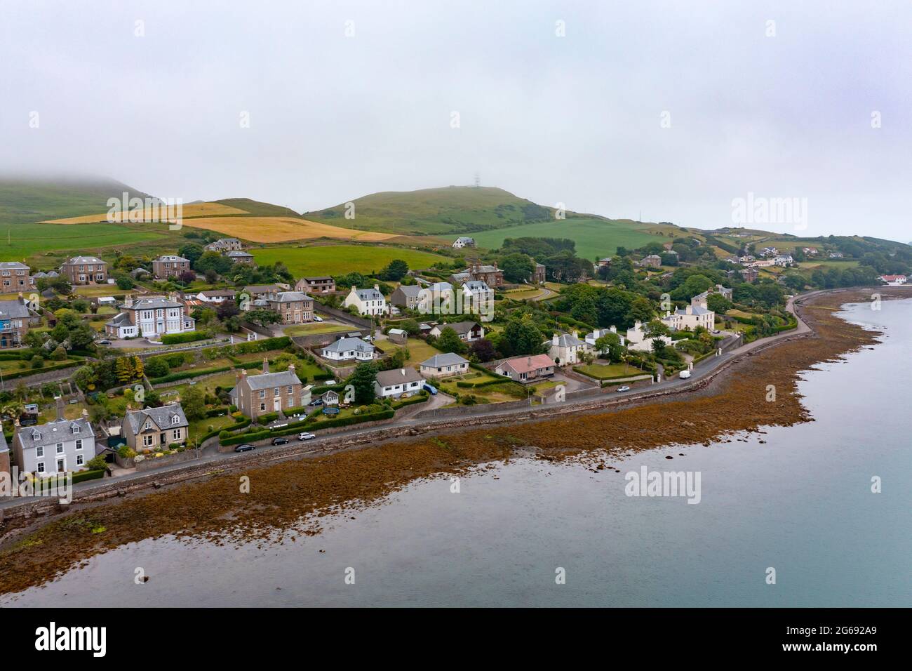 Aerial view from drone of large waterfront houses in Campbeltown on Kintyre peninsula , Argyll & Bute, Scotland UK Stock Photo