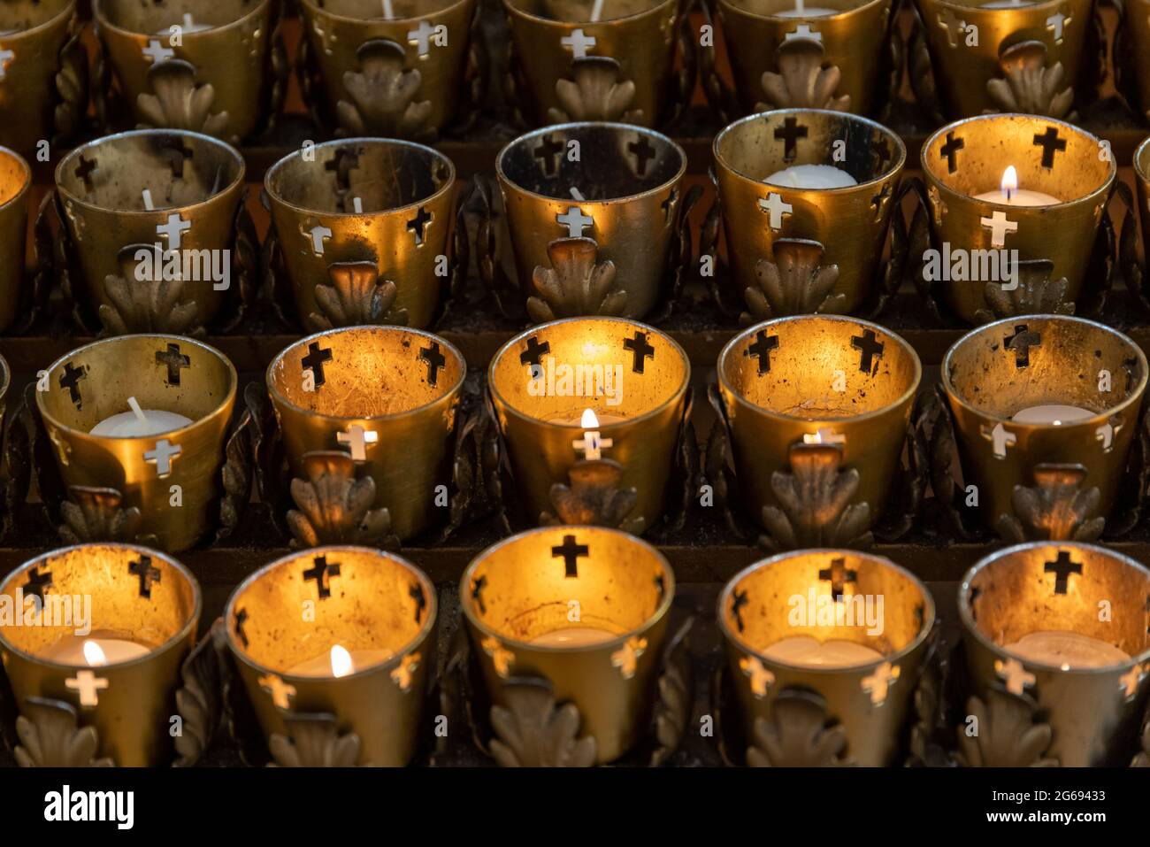 Votive Candles in Catholic Church. Stock Photo