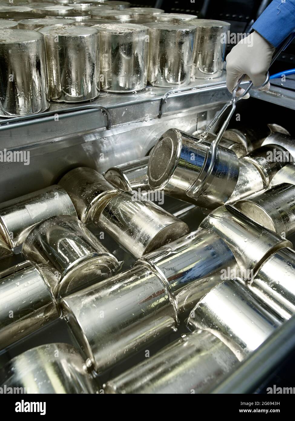 Hands holding raw lithium Stock Photo Alamy