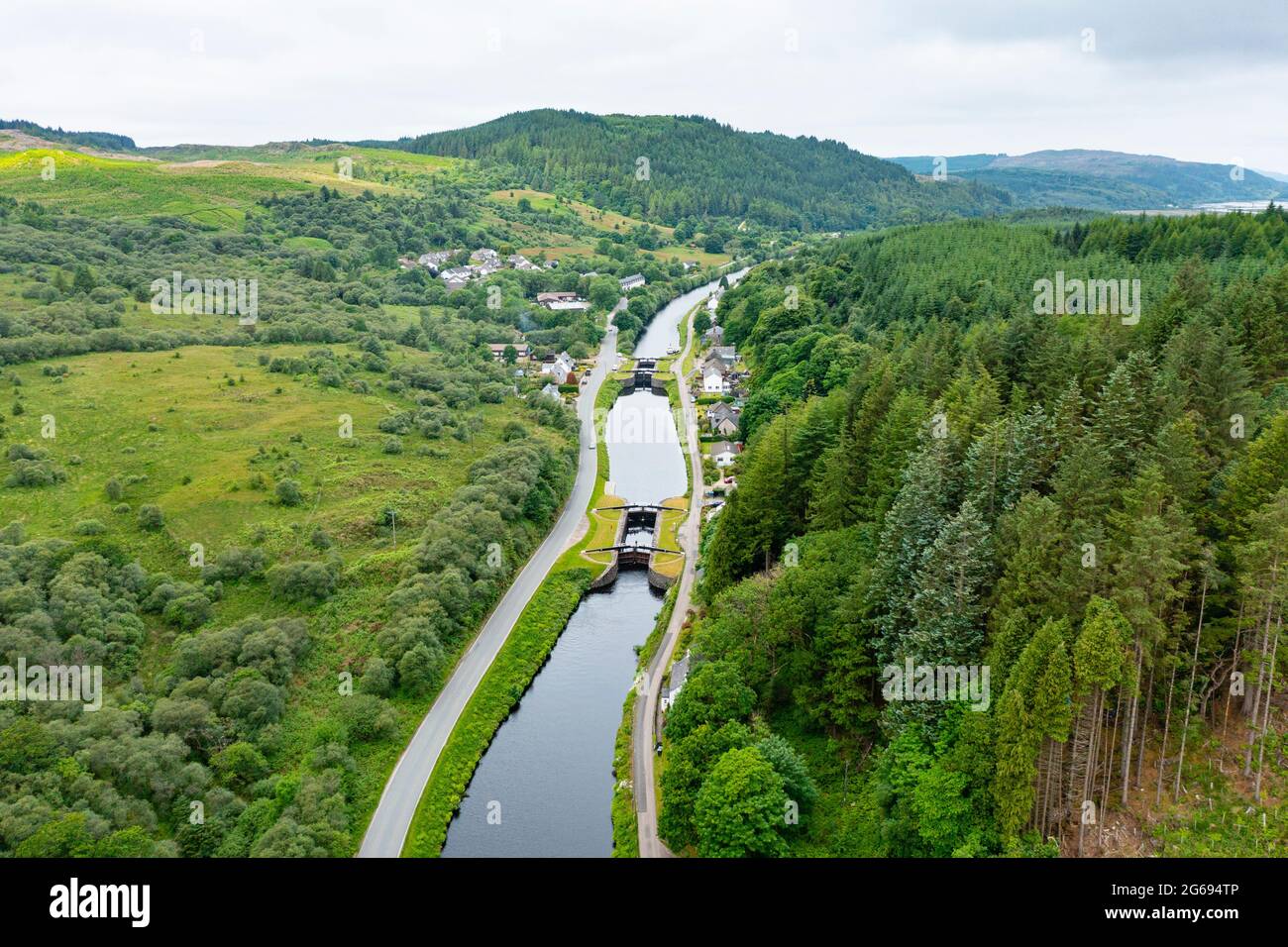 Aerial view from drone of Crinan Canal at village of Cairnbaan in Argyll & Bute, Scotland, UK Stock Photo