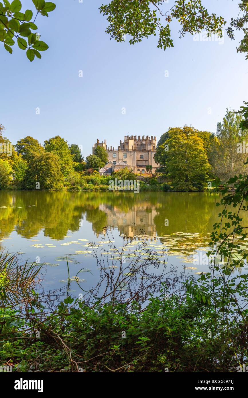 The view across the ornamental lake created by Capability Brown towards Sherborne Castle, Dorset, England, UK Stock Photo