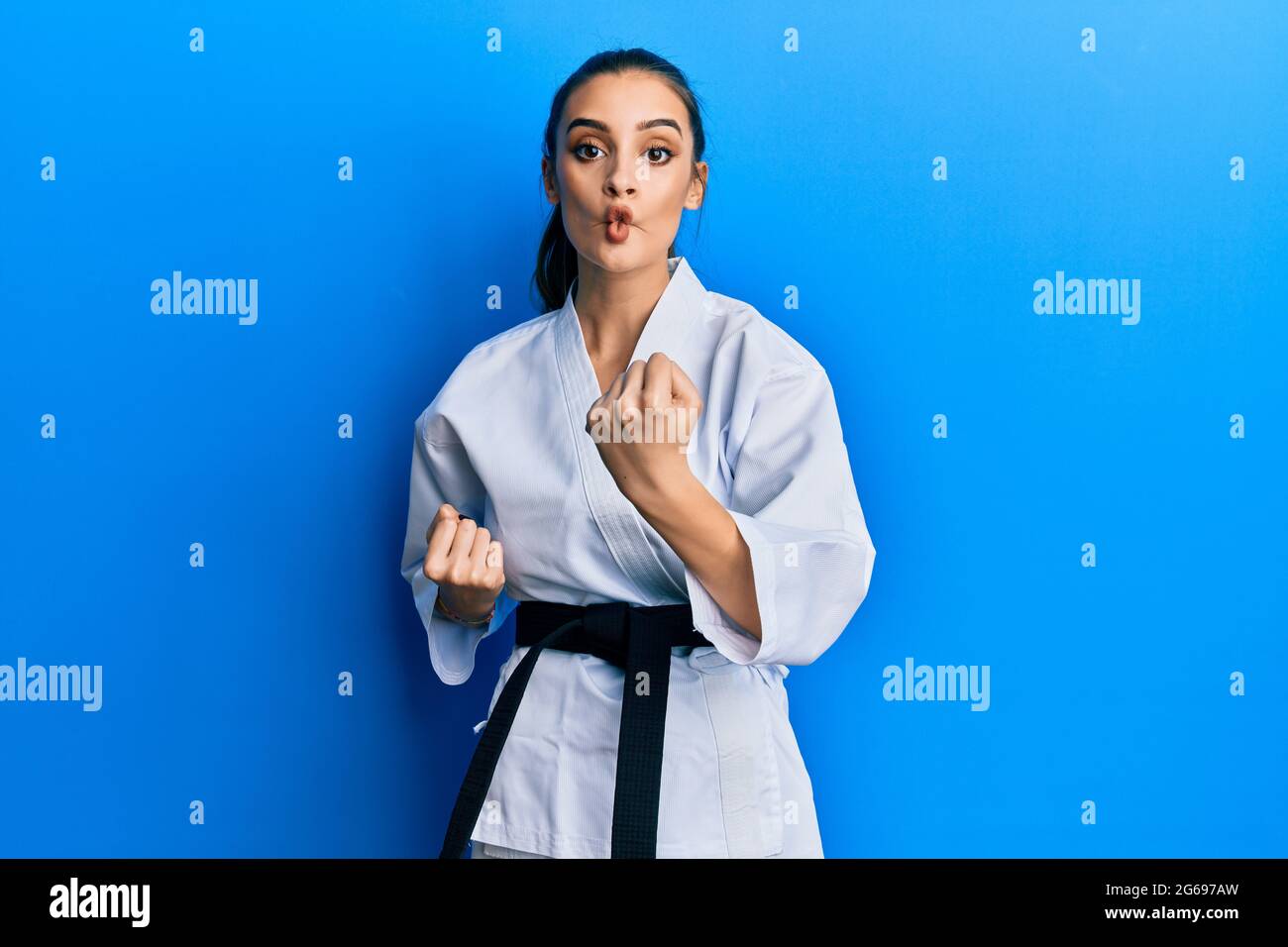 Young woman lying and relaxing in a Fish pose during her yoga lesson at  home Stock Photo - Alamy