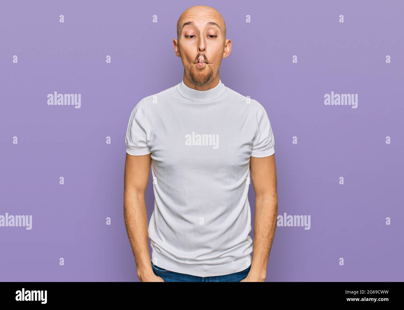 Bald man making funny face hi-res stock photography and images - Alamy