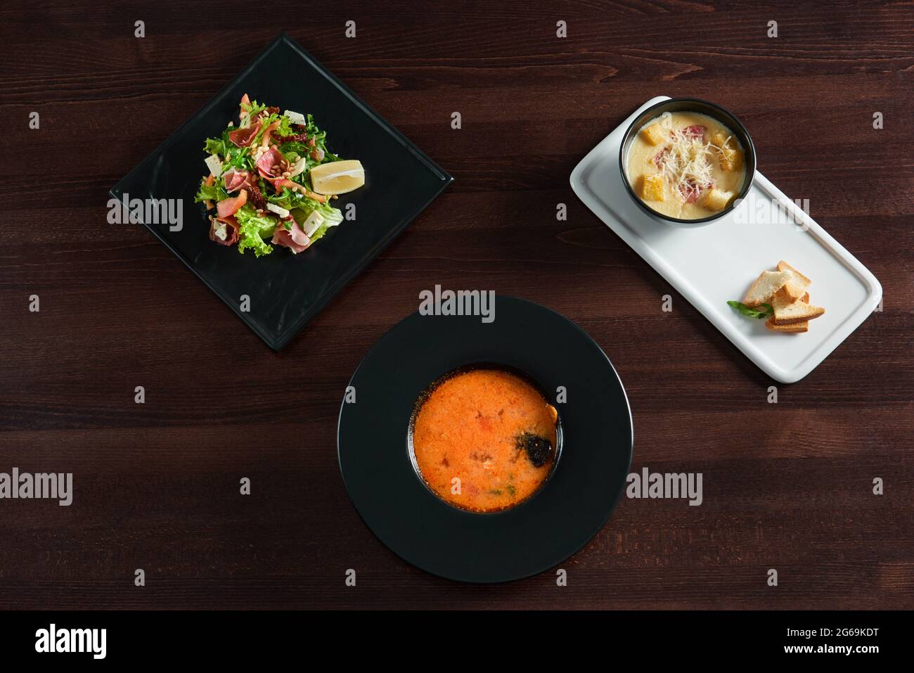 Restaurant table full of delicious food Stock Photo - Alamy