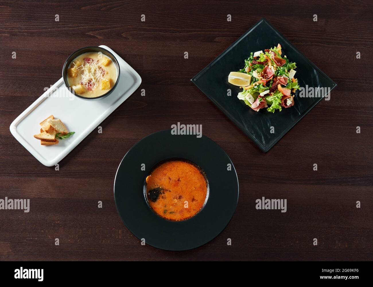 Restaurant table full of delicious food Stock Photo - Alamy
