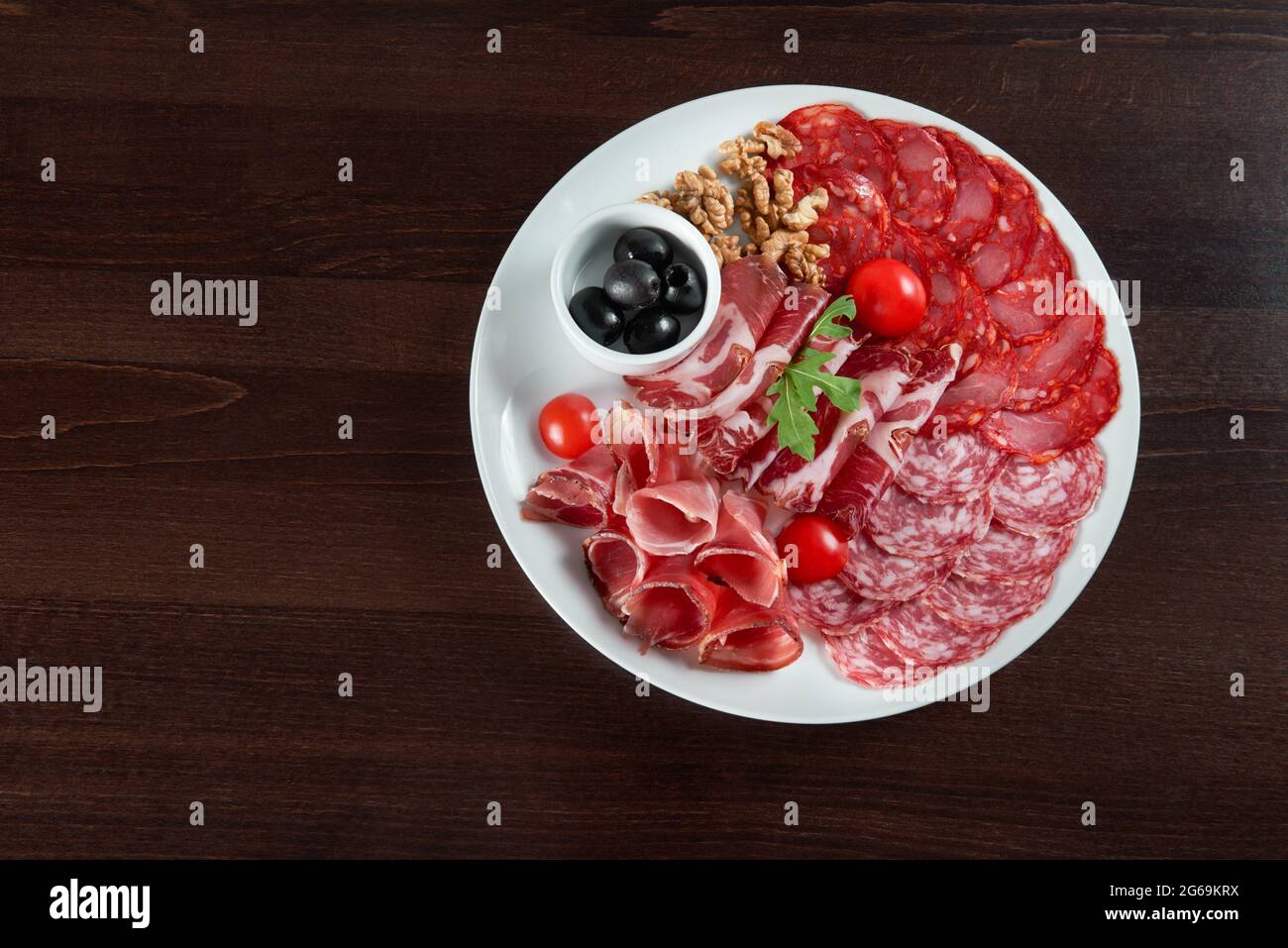 Assorted cold meat deli plate at the restaurant Stock Photo Alamy