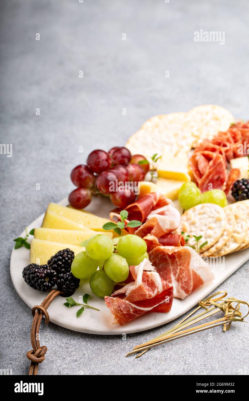Summer charcuterie board with cheese, meat and fruit Stock Photo Alamy