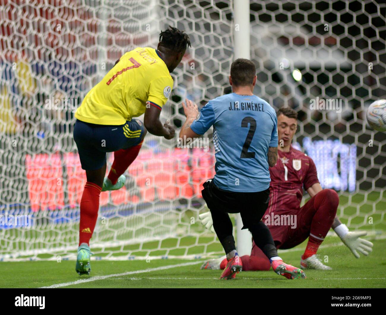 BRASILIA, BRAZIL - JULY 03: Duvan Zapata of Colombia competes for the ball with Fernando Muslera and Jose Gimenez of Uruguay ,during the Quarterfinal match between Uruguay and Colombia as part of Conmebol Copa America Brazil 2021 at Mane Garrincha Stadium on July 3, 2021 in Brasilia, Brazil. (MB Media) Stock Photo