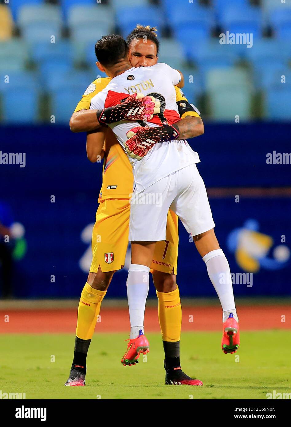 GOIANIA, BRAZIL - JULY 02: Yoshimar Yotun of Peru celebrates with Pedro Gallese after score his Penalty Kick in the shootout ,during the Quarterfinal match between Peru and Paraguay as part of Conmebol Copa America Brazil 2021 at Estadio Olimpico on July 2, 2021 in Goiania, Brazil. (MB Media) Stock Photo