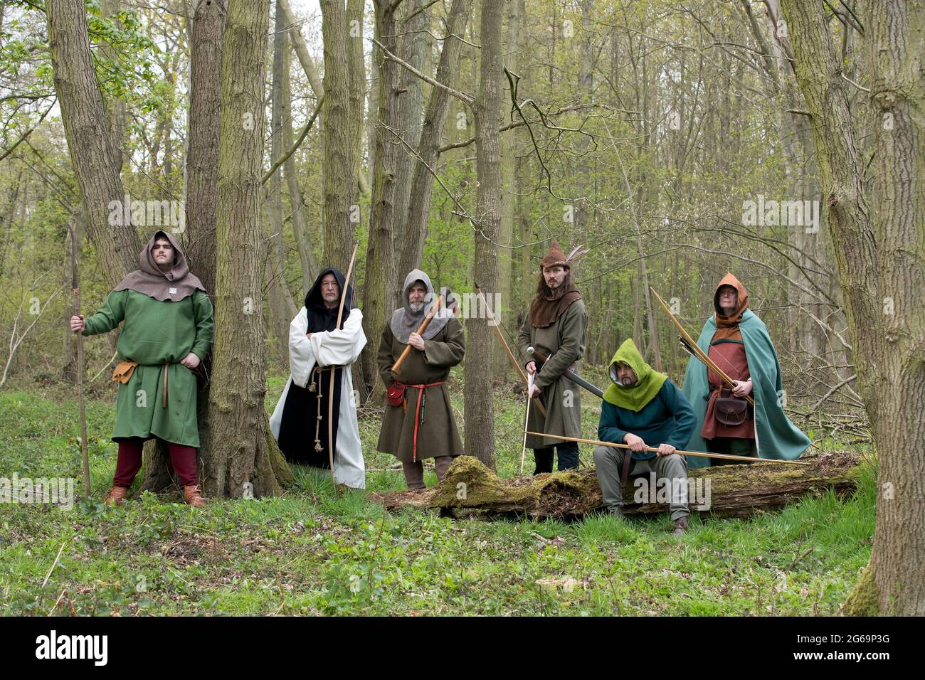 Interpretation of iconic English outlaw and rebel Robin Hood with his band of followers. Stock Photo