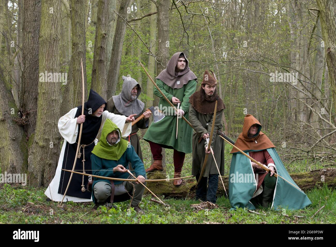 Interpretation of iconic English outlaw and rebel Robin Hood with his band of followers. Stock Photo